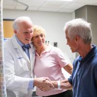 Joe and Cathy Marksteiner greeting Dr. Lowell Anthony, a specialist at Markey Cancer Center