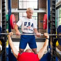 Joe and Cathy Marksteiner lifting weights together