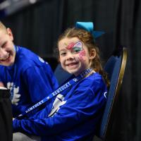 Izzy with her fellow Excite Night guest judge and Kentucky Children’s Hospital patient, Dalton Green. Izzy has unicorn face paint over one eye.